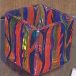 "STRIPES" 3" candle holder painted with bold multi-color paints on a textured glass surface. Piece was baked for added durability.
