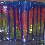 "PAINT RUN WILD" 3 1/2" glass candle holder. Layers of paints brushed on and allowed to run to complete their own design. Baked for added durability.